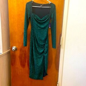 Tea length emerald green formal dress.  It is sparkling and beautiful.